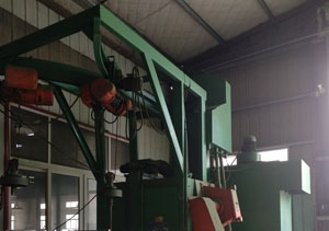 濟南歷下區(qū)拋丸機案例，型號為Q376雙掛鉤式打砂機